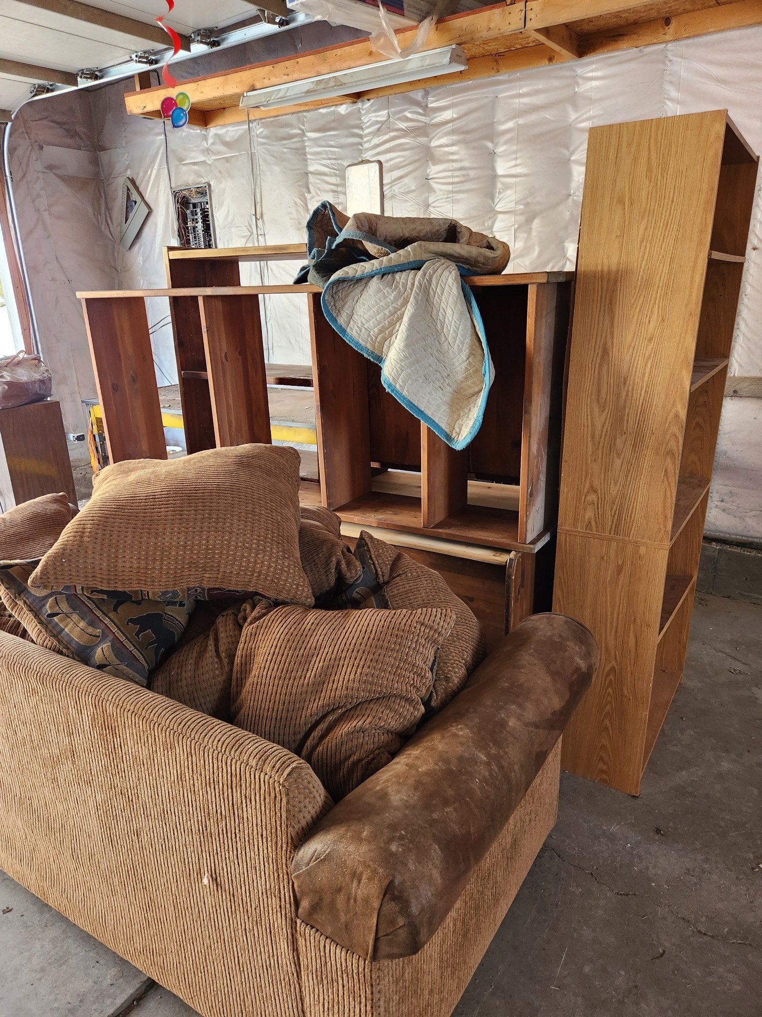 Furniture and shelving cleanout job in garage
